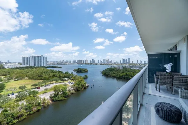 a view of swimming pool from a balcony