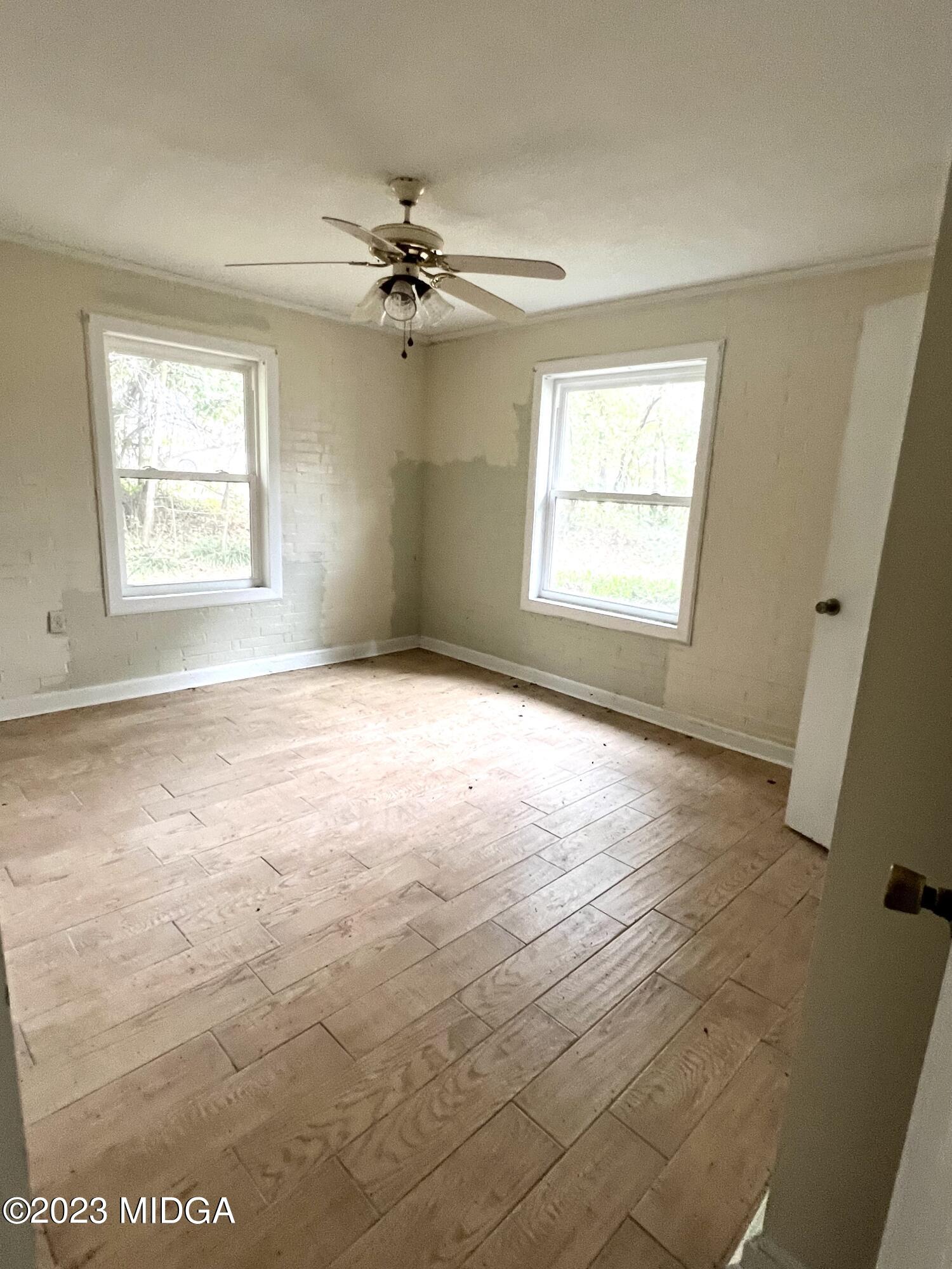 7615 Columbus Road Lizella, GA 31052 - Photo 41 of 56 a view of an empty room with a window