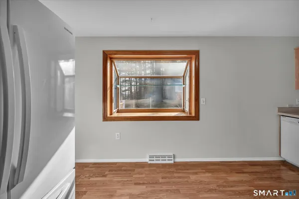 a view of a room that has a window in it