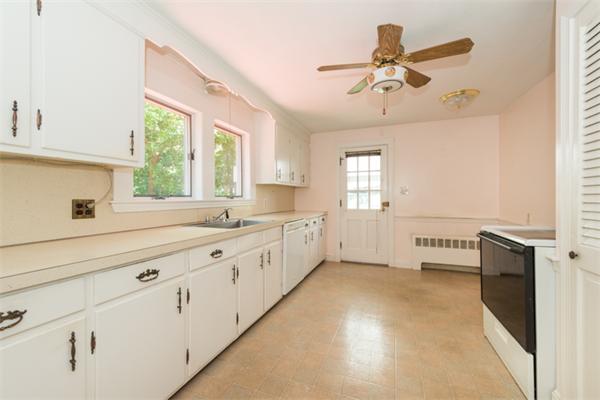 20 Overlook Road Arlington, MA 02474 - Photo 4 of 17 a large white kitchen with a large window