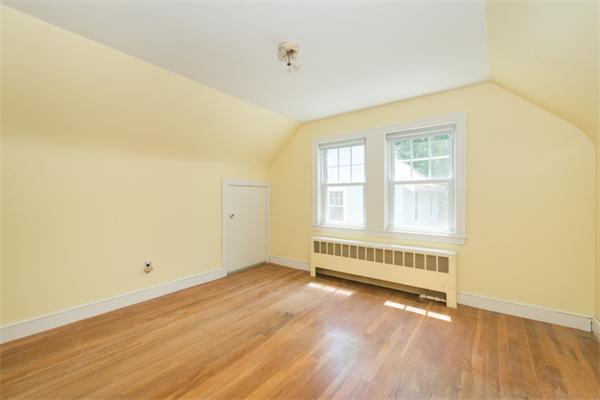 20 Overlook Road Arlington, MA 02474 - Photo 9 of 17 an empty room with wooden floor and windows