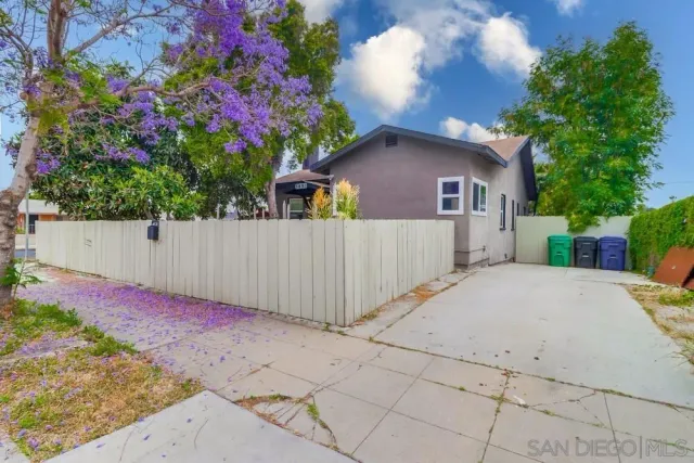 a front view of a house with a garage