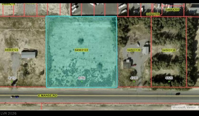 4760 East Manse Road Pahrump, NV 89061 - Photo 4 of 4 Prime development opportunity with a spacious, flat parcel offering roadside visibility.