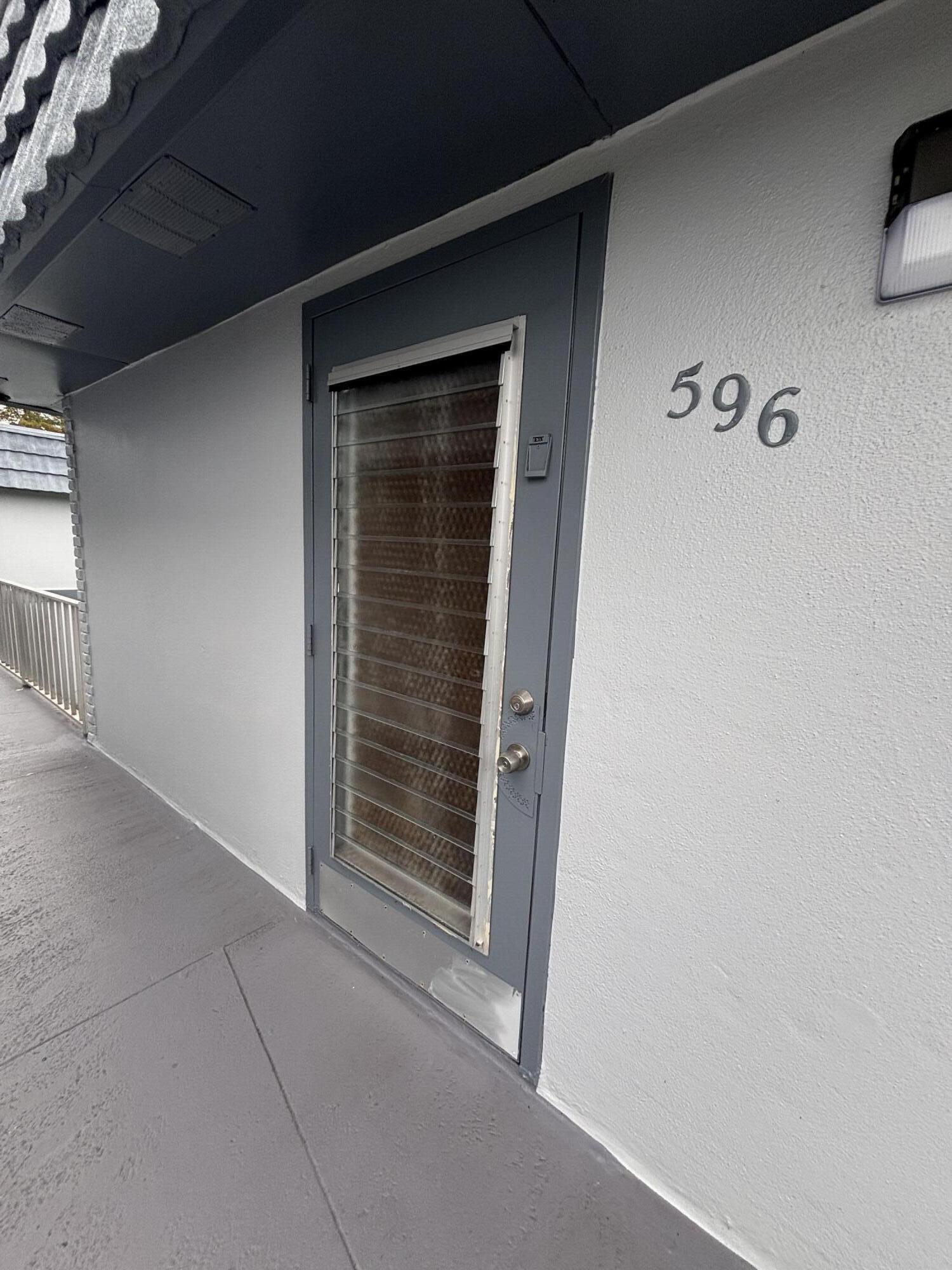 596 Saxony M, Unit 596 Delray Beach, FL 33446 - Photo 17 of 22 a view of an empty room