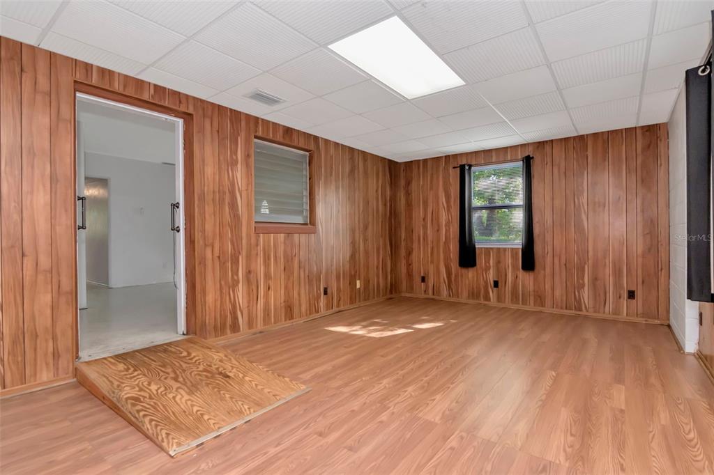 230 Milwaukee Avenue Dunedin, FL 34698 - Photo 21 of 61 an empty room with windows and closet