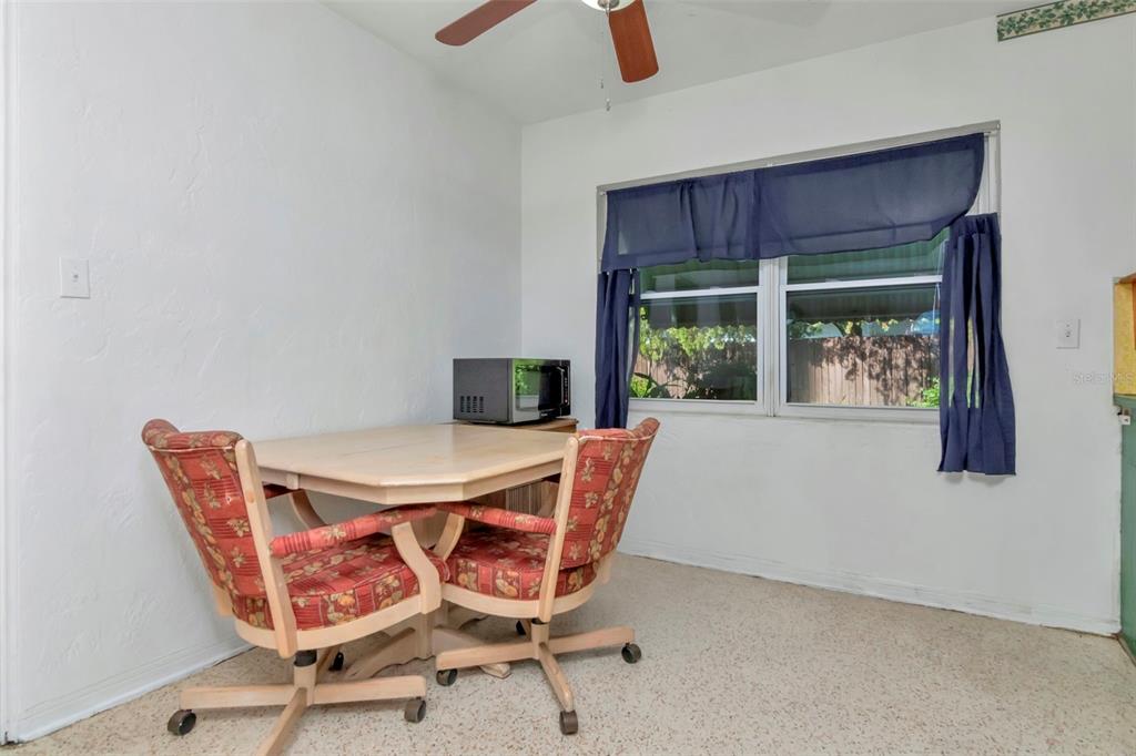 230 Milwaukee Avenue Dunedin, FL 34698 - Photo 25 of 61 a dining room with furniture and window
