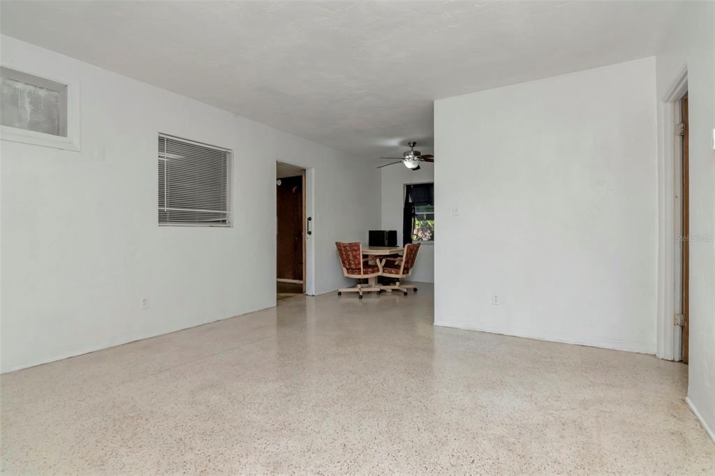 230 Milwaukee Avenue Dunedin, FL 34698 - Photo 28 of 61 a view of work space with furniture and a window