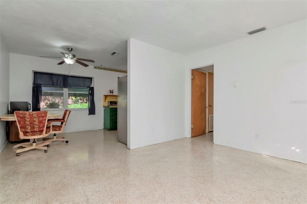 230 Milwaukee Avenue Dunedin, FL 34698 - Photo 29 of 61 a view of a room with furniture and a ceiling fan