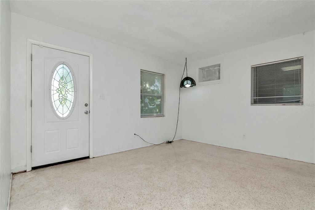 230 Milwaukee Avenue Dunedin, FL 34698 - Photo 30 of 61 an empty room with windows