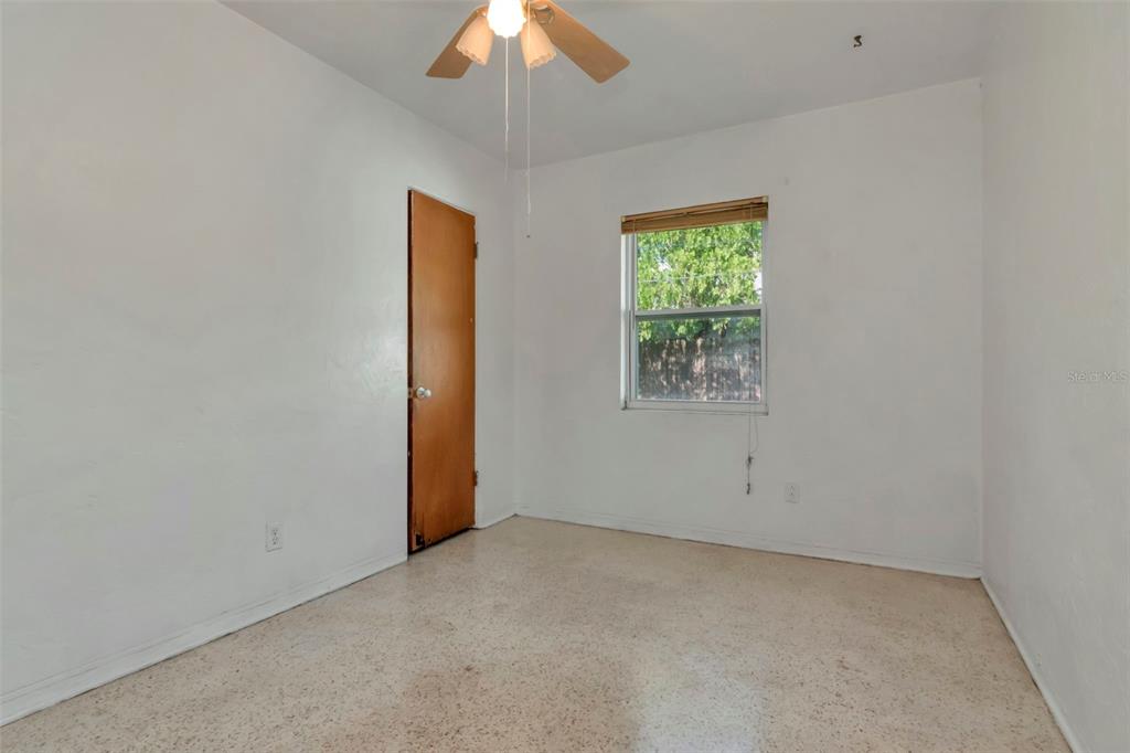 230 Milwaukee Avenue Dunedin, FL 34698 - Photo 37 of 61 an empty room with a window