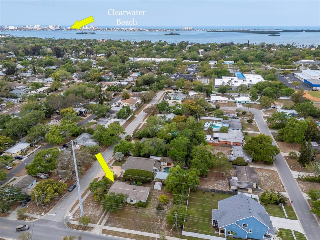 230 Milwaukee Avenue Dunedin, FL 34698 - Photo 9 of 61 an aerial view of a houses with a yard