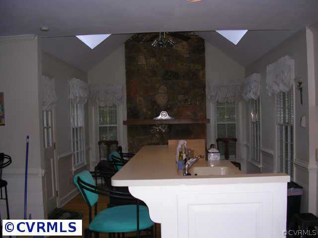 3208 Fortunes Ridge Road Midlothian, VA 23112 - Photo 5 of 10 a bathroom with a sink and a mirror