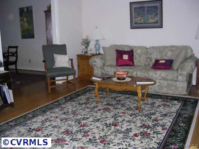 3208 Fortunes Ridge Road Midlothian, VA 23112 - Photo 6 of 10 a living room with furniture and a rug