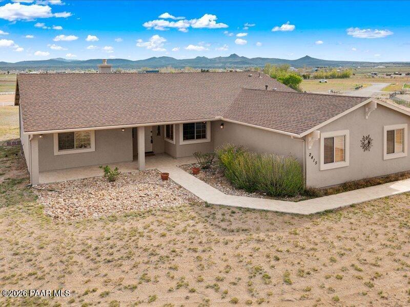 a view of a terrace with a lake view