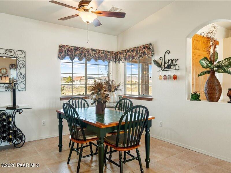 2415 Sherry Paulden, AZ 86334 - Photo 11 of 41 a view of a dining room with furniture and chandelier