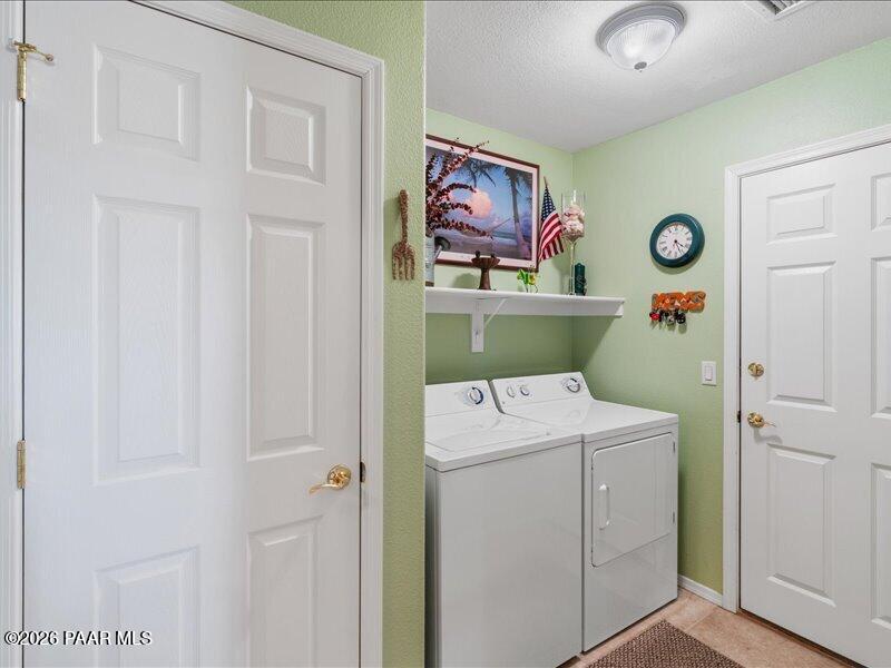 2415 Sherry Paulden, AZ 86334 - Photo 13 of 41 a utility room with dryer and washer