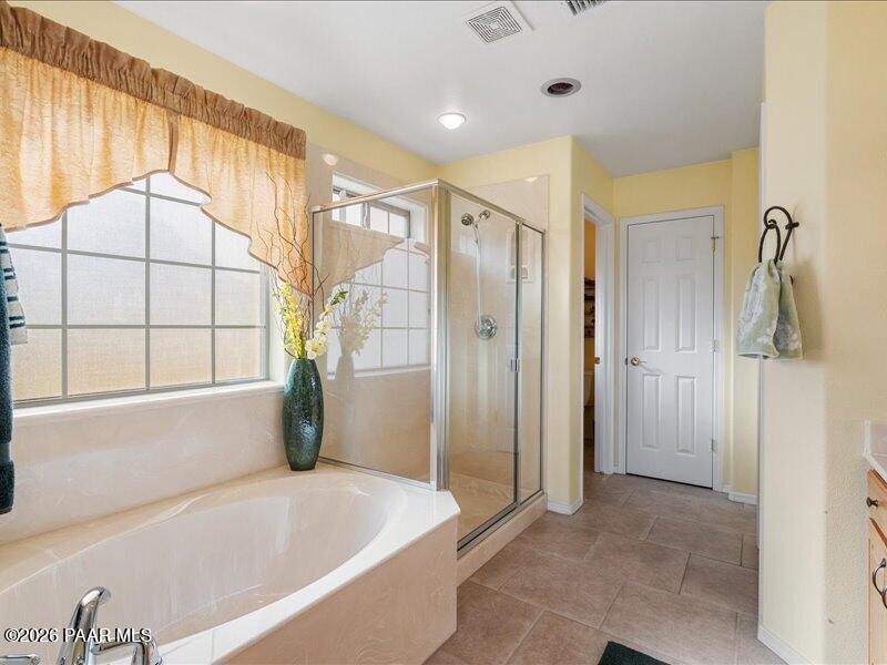 2415 Sherry Paulden, AZ 86334 - Photo 19 of 41 a bathroom with a bathtub and a shower