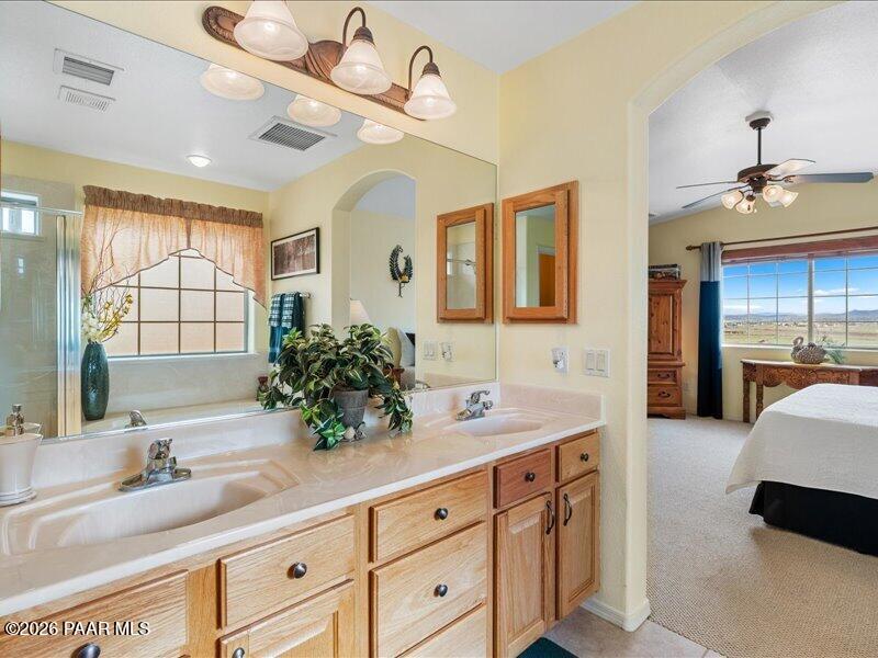 2415 Sherry Paulden, AZ 86334 - Photo 20 of 41 a spacious en suite bathroom with double sink and a mirror