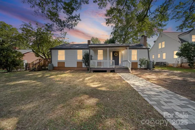 a house view with a backyard space