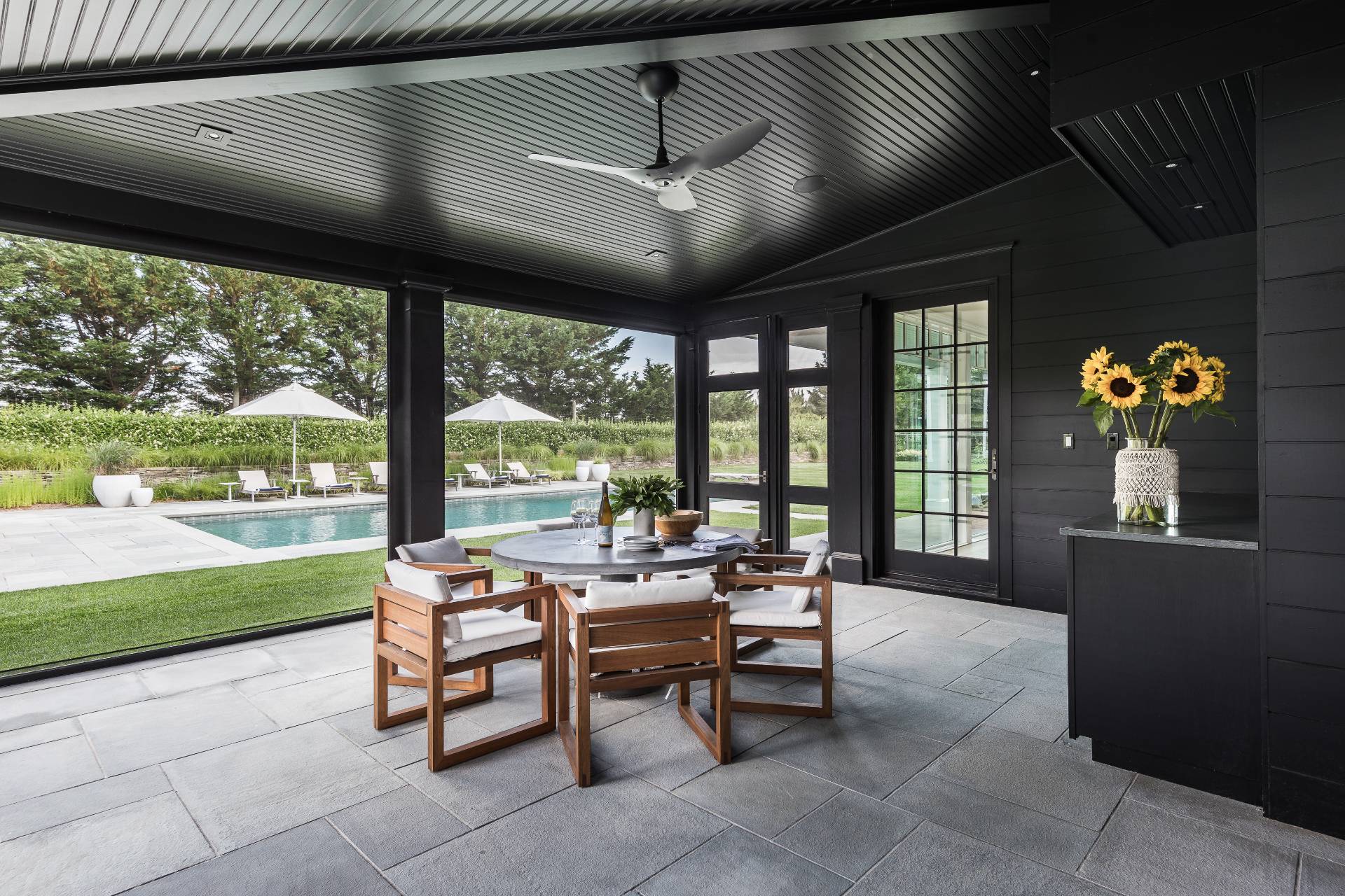 373 Mitchell Lane Bridgehampton, NY 11932 - Photo 12 of 34 a living room with large windows
