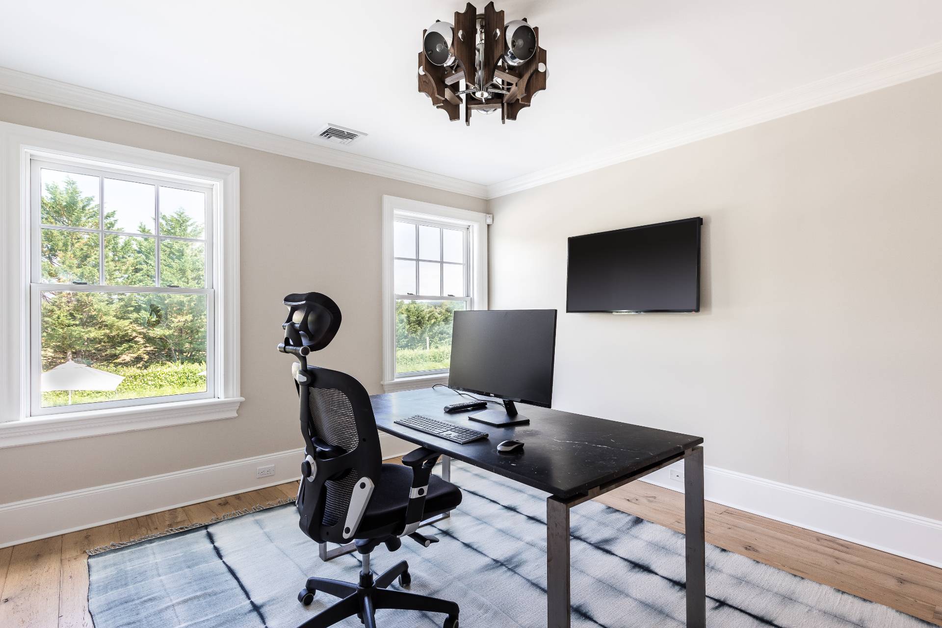 373 Mitchell Lane Bridgehampton, NY 11932 - Photo 15 of 34 a view of a workspace with furniture and a window