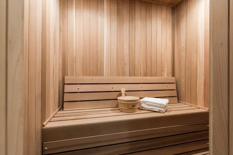 a bedroom with a bed and a desk