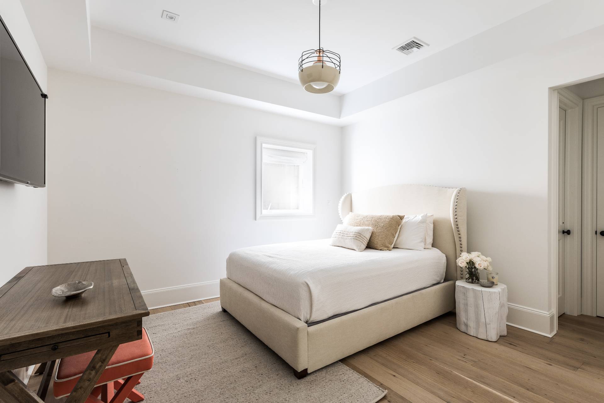 373 Mitchell Lane Bridgehampton, NY 11932 - Photo 26 of 34 a bedroom with a bed and a desk