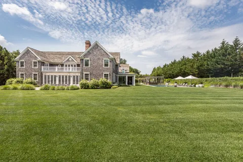 an aerial view of a house with a garden