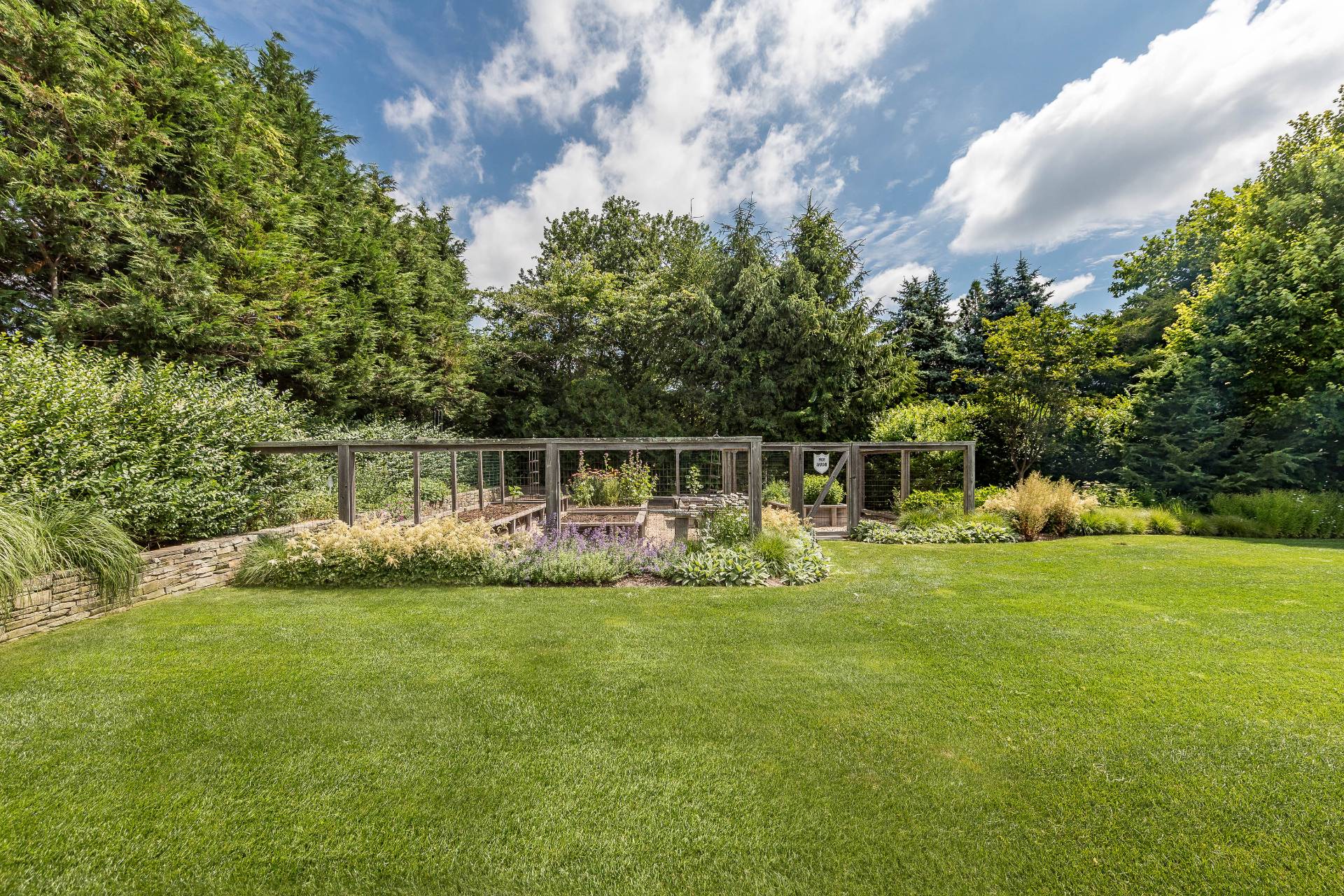 373 Mitchell Lane Bridgehampton, NY 11932 - Photo 28 of 31 a view of a house with a big yard