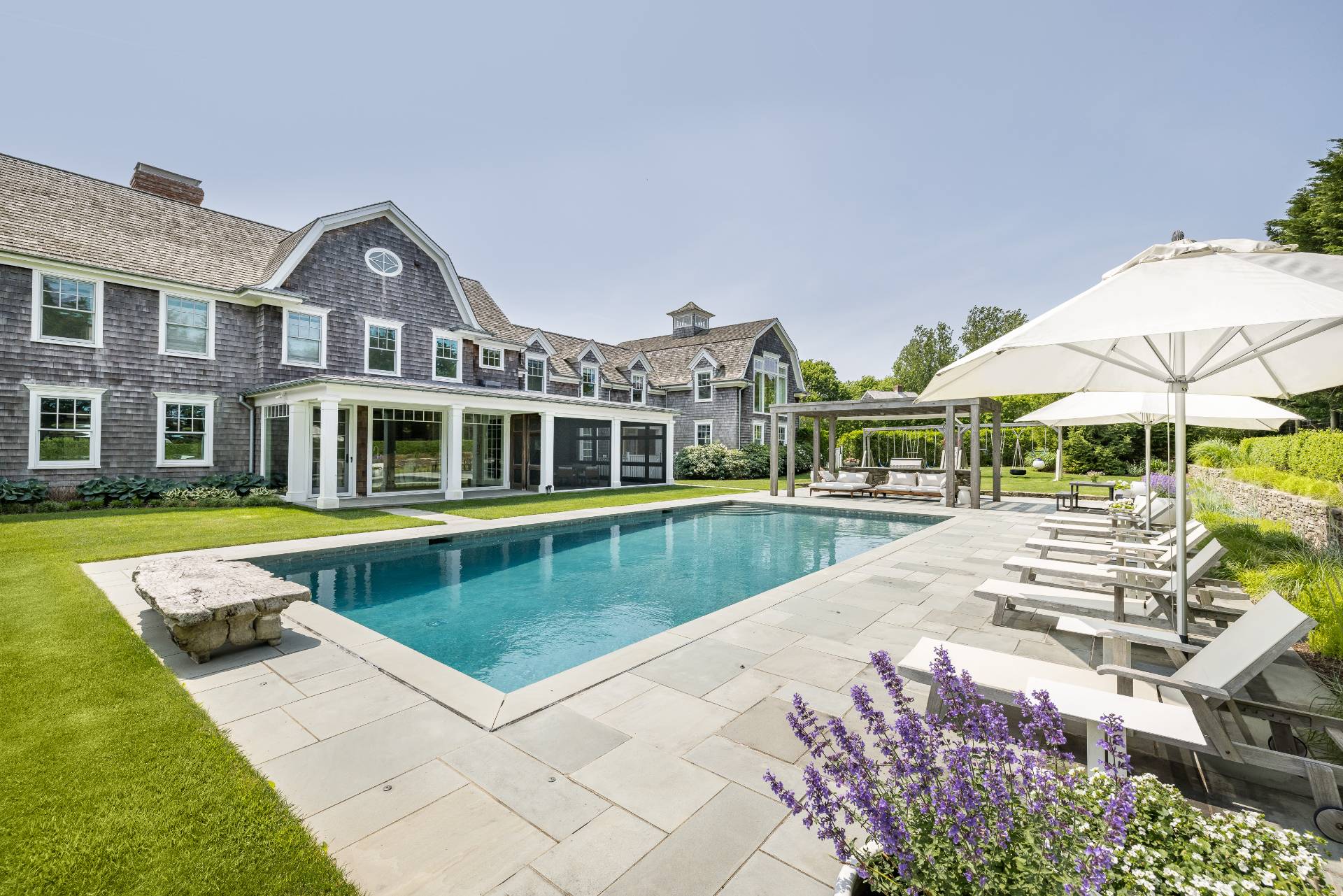 373 Mitchell Lane Bridgehampton, NY 11932 - Photo 29 of 31 a view of a house with a swimming pool