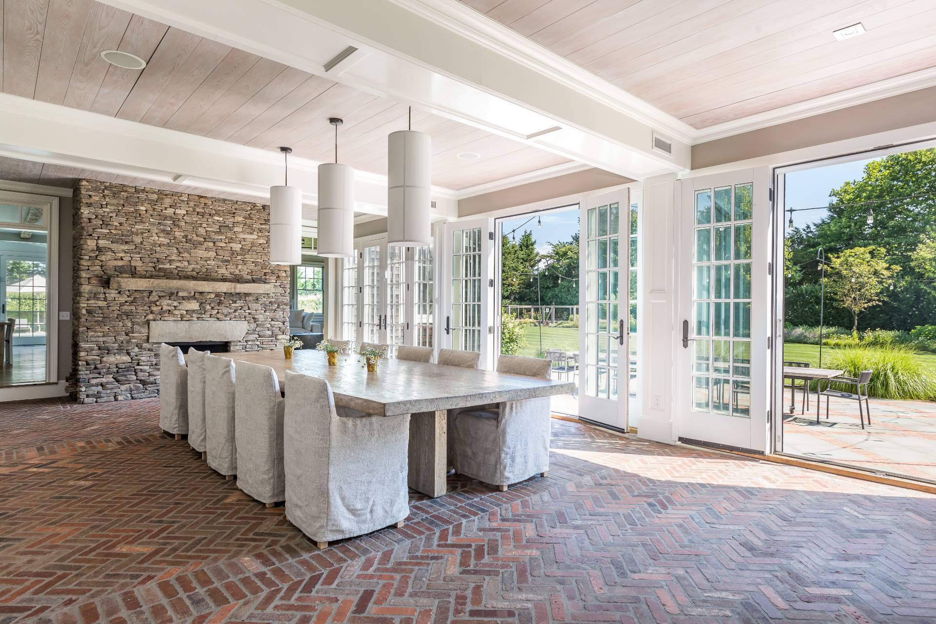 373 Mitchell Lane Bridgehampton, NY 11932 - Photo 10 of 34 a view of open kitchen with granite countertop a stove top oven