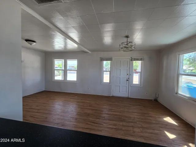 a view of cabinets with wooden floor