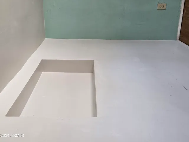 a bathroom with a sink and shower