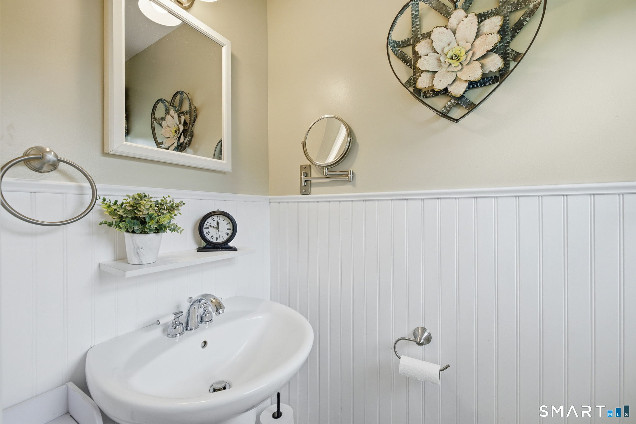 7 Stardust Drive Enfield, CT 06082 - Photo 14 of 38 a bathroom with a sink and a mirror