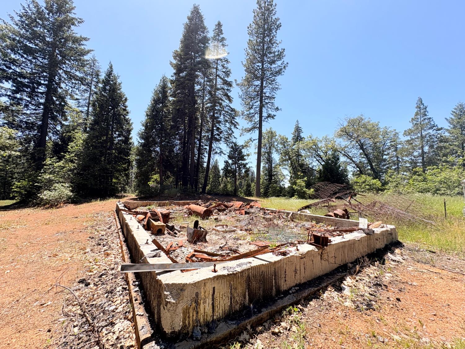 14666 Woolford Mill Road Nevada City, CA 95959 - Photo 5 of 12 a view of a backyard with sitting area