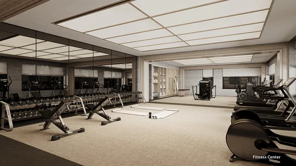 a living room with furniture gym equipment and a large window
