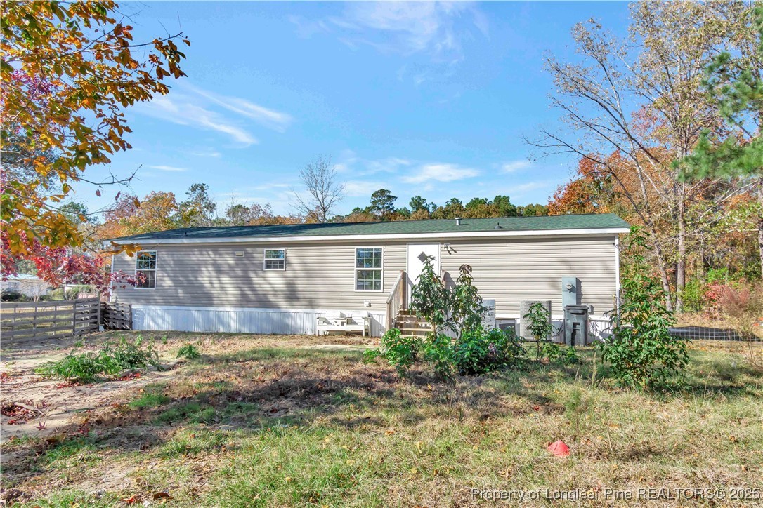 157 Amarilla Road Fairmont, NC 28340 - Photo 21 of 24 front view of house with a yard