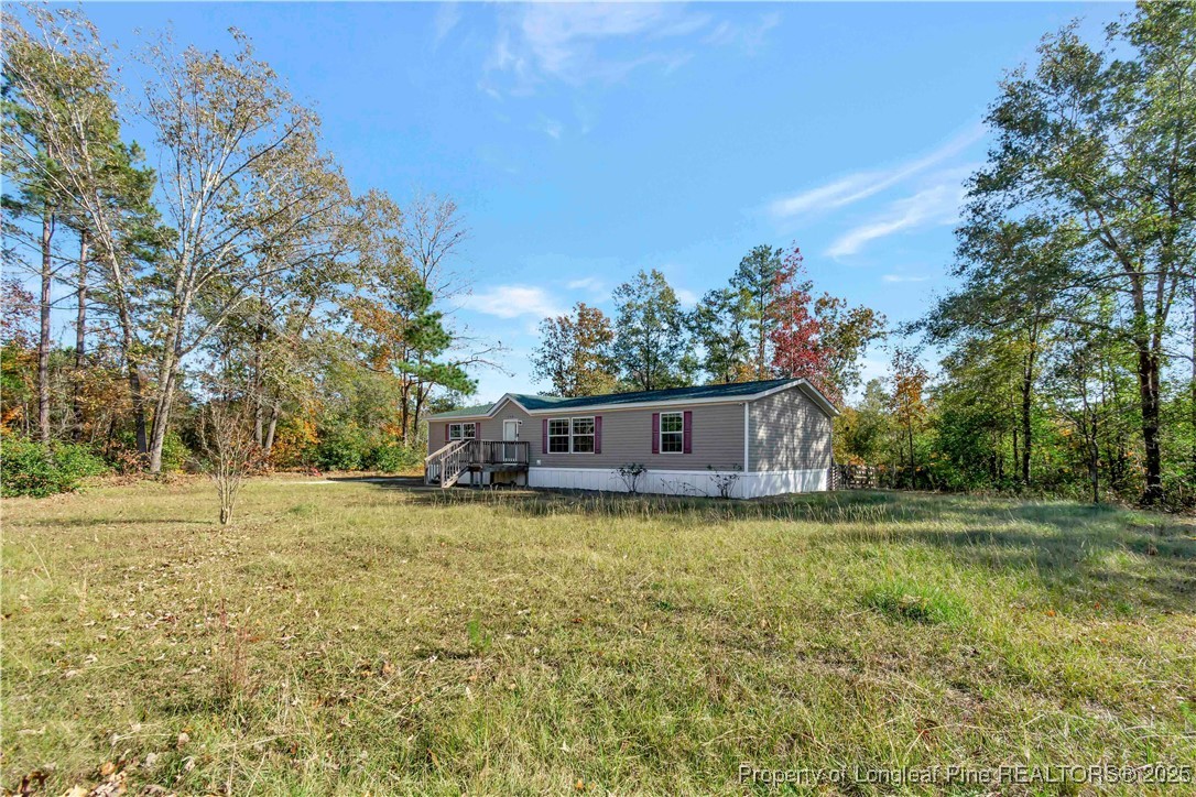 157 Amarilla Road Fairmont, NC 28340 - Photo 4 of 24 a house view with a outdoor space