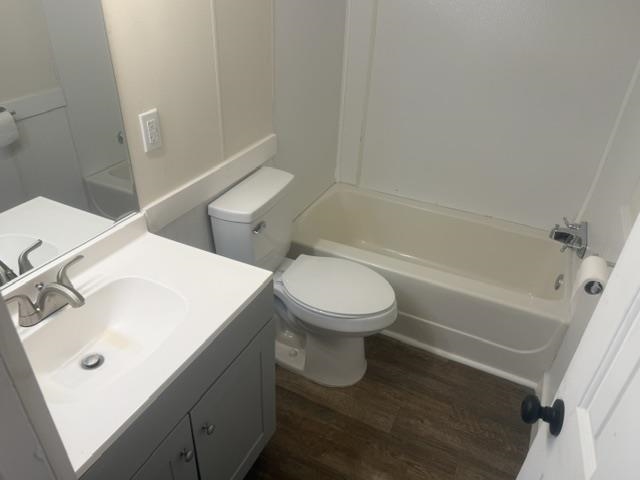 1100 Pine Top Road Toone, TN 38381 - Photo 19 of 40 Bathroom featuring a vanity with integrated sink, chrome faucet, and mirrored wall