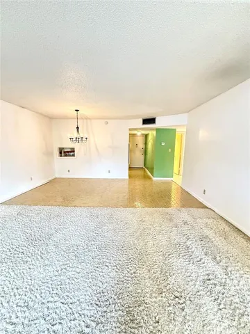 a view of a kitchen with a sink