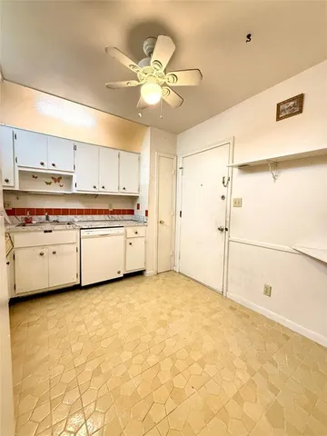 a view of a kitchen with a stove