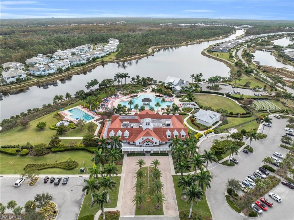8795 Calypso Court Naples, FL 34113 - Photo 40 of 49 a view of a city with an ocean