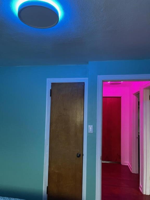 225 Greenlee Road Pittsburgh, PA 15227 - Photo 12 of 24 an empty room with a lamp and wooden floor