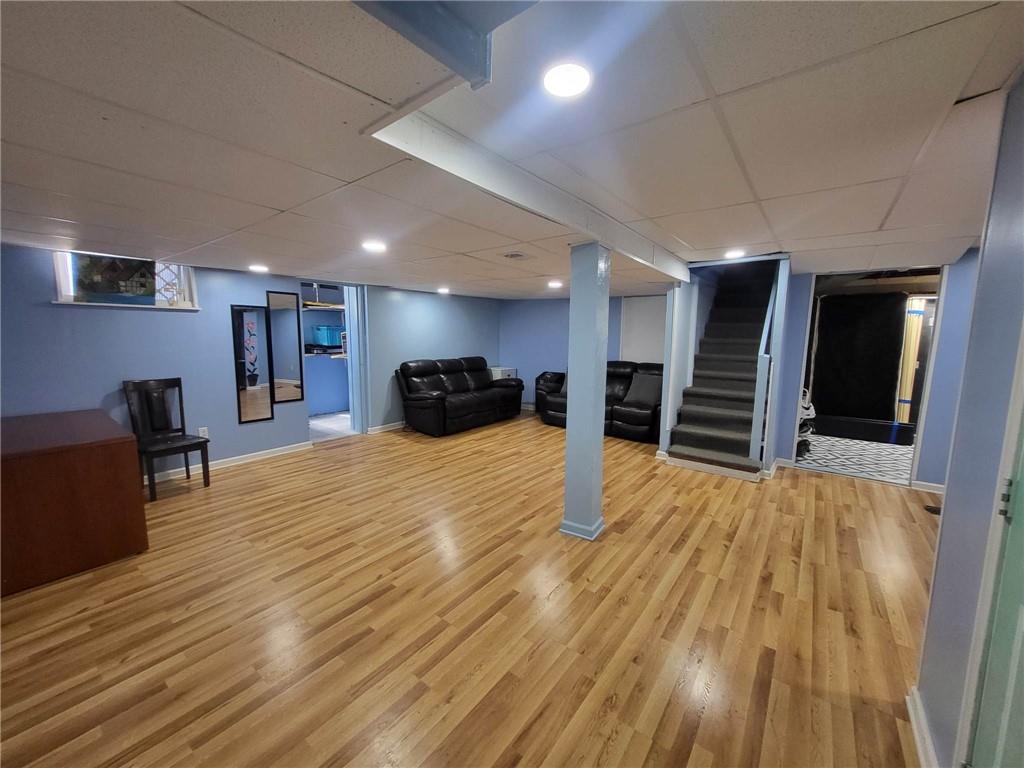 225 Greenlee Road Pittsburgh, PA 15227 - Photo 19 of 24 a big room with wooden floor and furniture