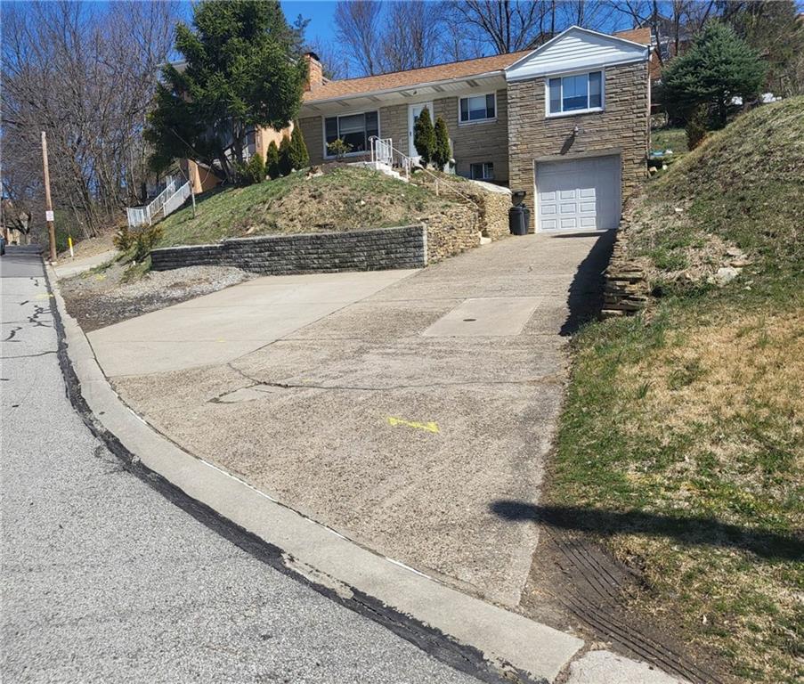 225 Greenlee Road Pittsburgh, PA 15227 - Photo 2 of 24 a front view of a house with a yard