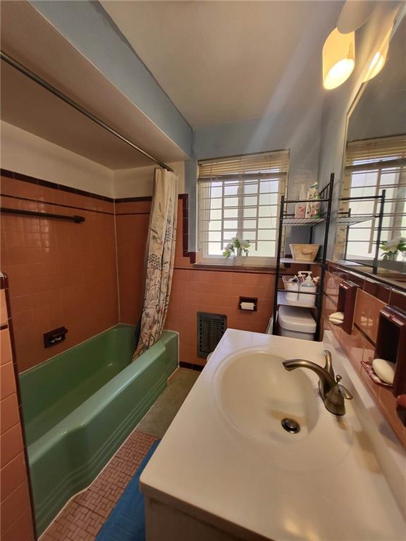 225 Greenlee Road Pittsburgh, PA 15227 - Photo 10 of 24 a bathroom with a sink and a large window