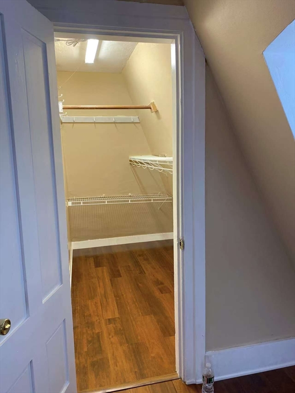 12 Baldwin Street, Unit 1 Newton, MA 02458 - Photo 7 of 7 a bathroom with a glass shower door