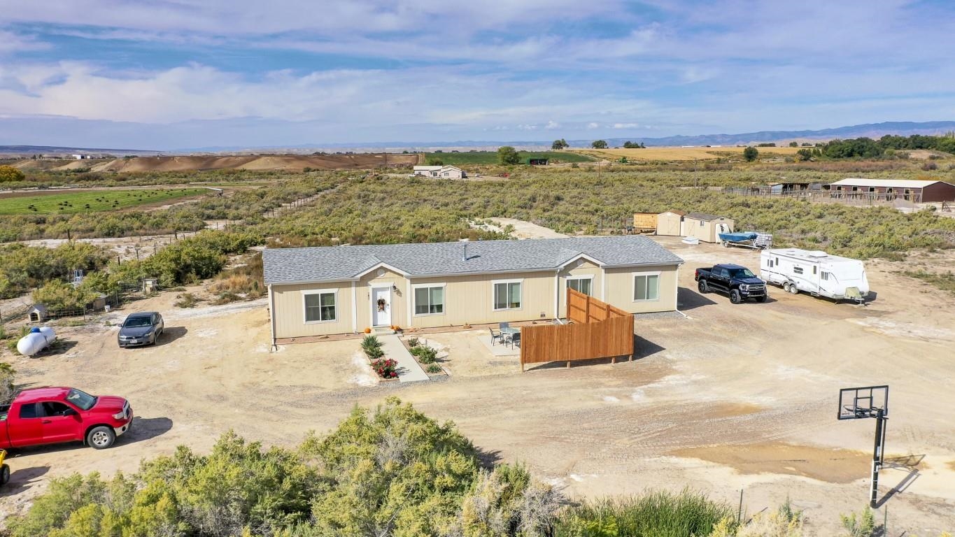 1831 10 Road Mack, CO 81525 - Photo 1 of 27 an aerial view of residential houses with outdoor space
