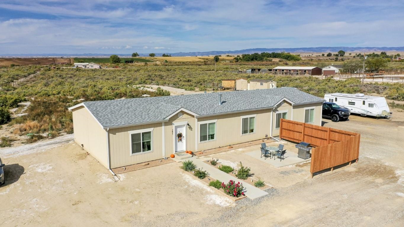 1831 10 Road Mack, CO 81525 - Photo 26 of 27 an aerial view of residential houses with outdoor space