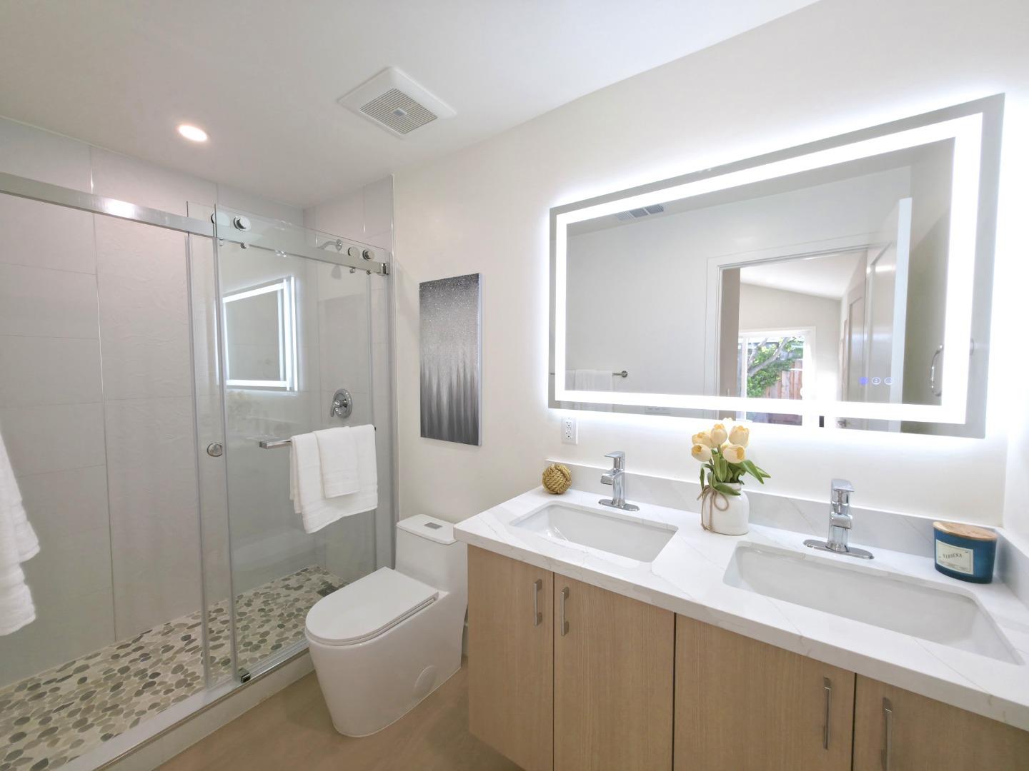 6746 Bollinger Road San Jose, CA 95129 - Photo 20 of 30 a bathroom with a sink toilet and shower